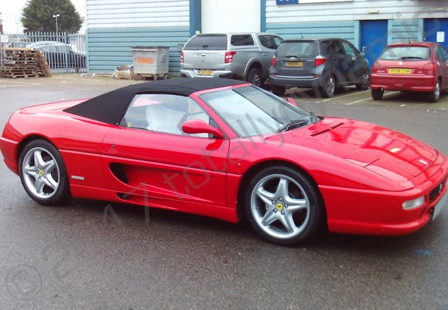 Ferrari F355 Spyder vinyl wrapped in a metallic black car wrap