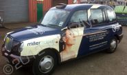 Taxi cab wrapped in printed design by Totally Dynamic Central Scotland