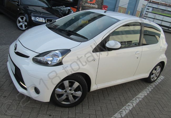 Toyota Aygo in a printed vinyl car wrap for Kare Plus