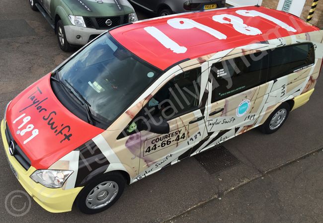 Taxi fully wrapped by Totally Dynamic Norfolk in a Taylor Swift printed vinyl taxi wrap to promote her appearance at Radio 1s Big Weekend 2015