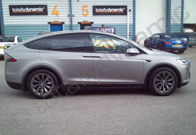 Tesla Model X fully wrapped in a matt aluminium grey car wrap