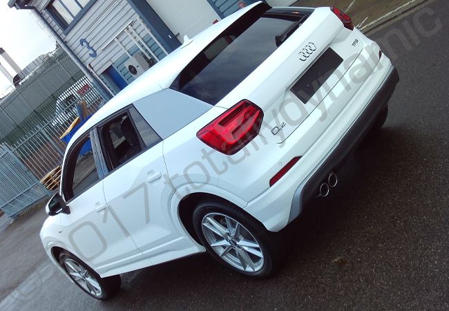 Audi Q2 fully vinyl wrapped in a matt white car wrap