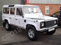 Land Rover Defender fleet wrapped in gloss white vinyl by Totally Dynamic Lincolnshire
