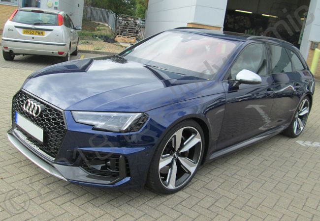 Audi RS4 fully wrapped in a gloss mid blue car wrap