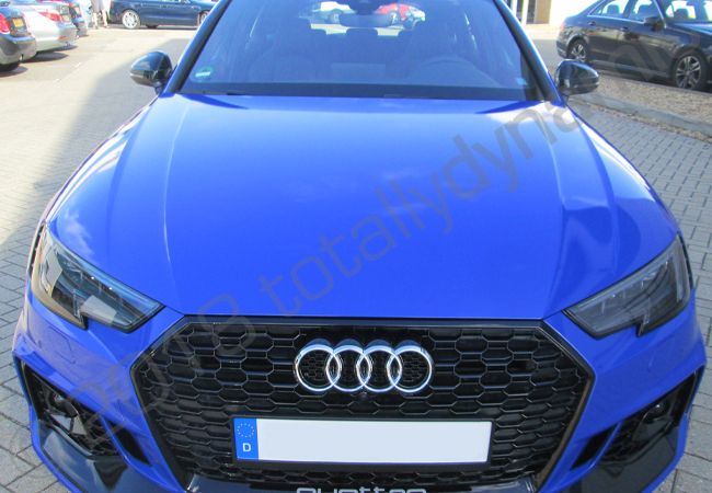 Audi RS4 fully wrapped in a gloss mid blue car wrap