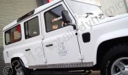 Land Rover Defender fleet wrapped in gloss white vinyl by Totally Dynamic Lincolnshire
