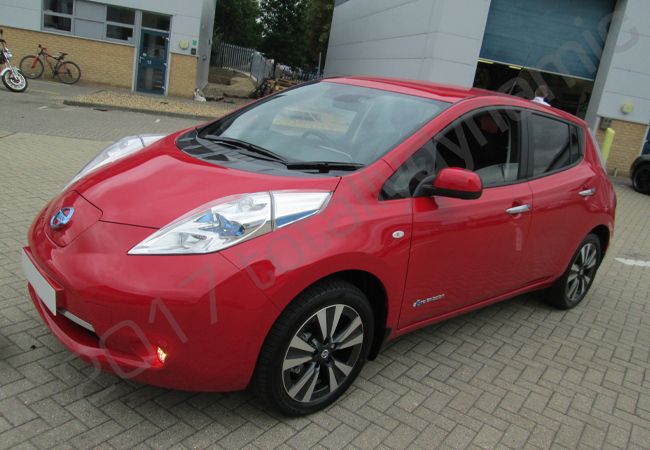 Nissan Leaf fully wrapped in a colour-matched pink vinyl car wrap