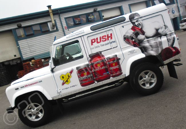 Land Rover Defender fully wrapped in a printed vinyl car wrap for Push Supplements by Totally Dynamic North London