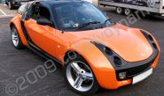 Smart Roadster wrapped orange by Totally Dynamic North London