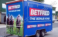 Small trailer fully vinyl wrapped in printed design by Totally Dynamic Leeds
