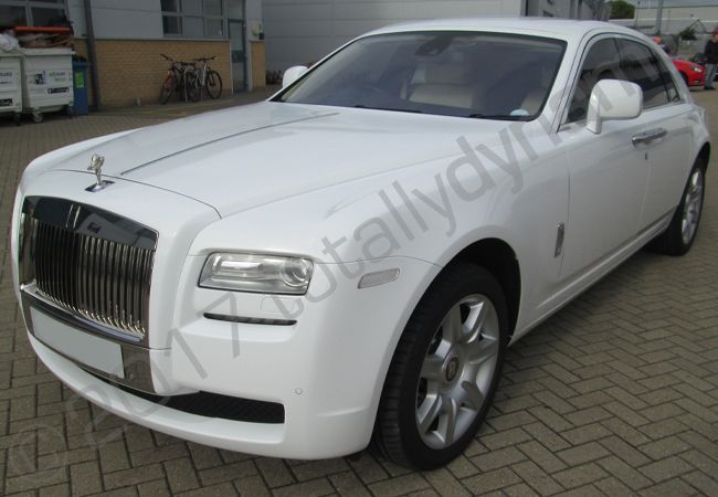 Rolls Royce Ghost fully wrapped in a gloss white vinyl car wrap