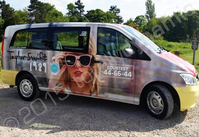 Taxi fully wrapped by Totally Dynamic Norfolk in a Taylor Swift printed vinyl taxi wrap to promote her appearance at Radio 1s Big Weekend 2015