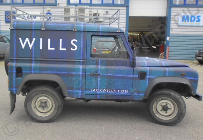 Land Rover Defender vinyl wrapped for Jack Wills in a tartan car wrap
