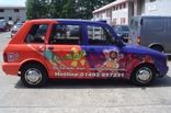 Metrocab Taxi - designed and wrapped by Totally Dynamic Norwich