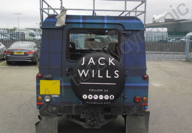 Land Rover Defender vinyl wrapped for Jack Wills in a tartan car wrap