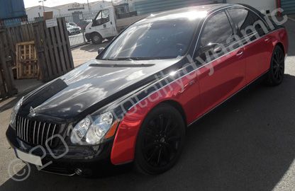 Maybach wrapped in red chrome with black grill by Totally Dynamic North London